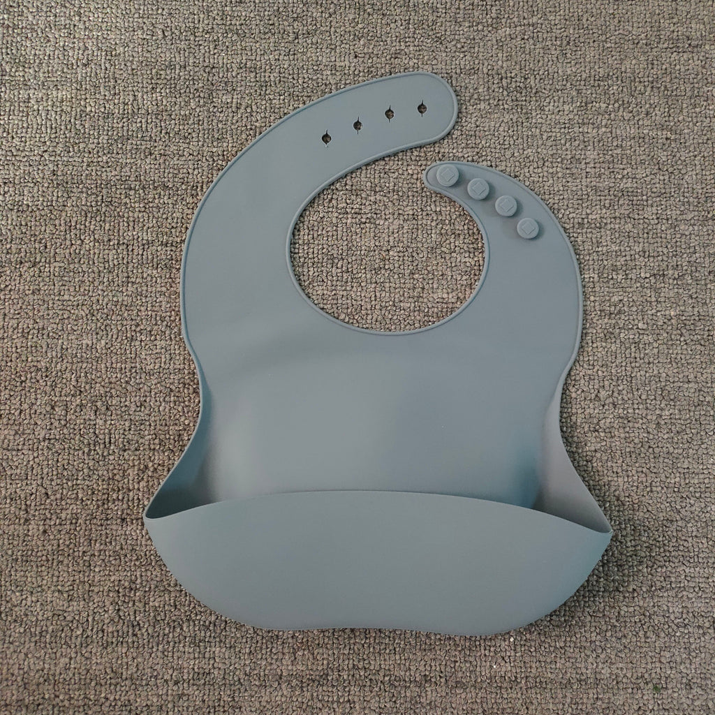 WarmNest™ Silicone Baby Bib with Food Catcher – Waterproof & Easy Clean