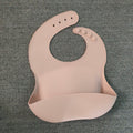 WarmNest™ Silicone Baby Bib with Food Catcher – Waterproof & Easy Clean