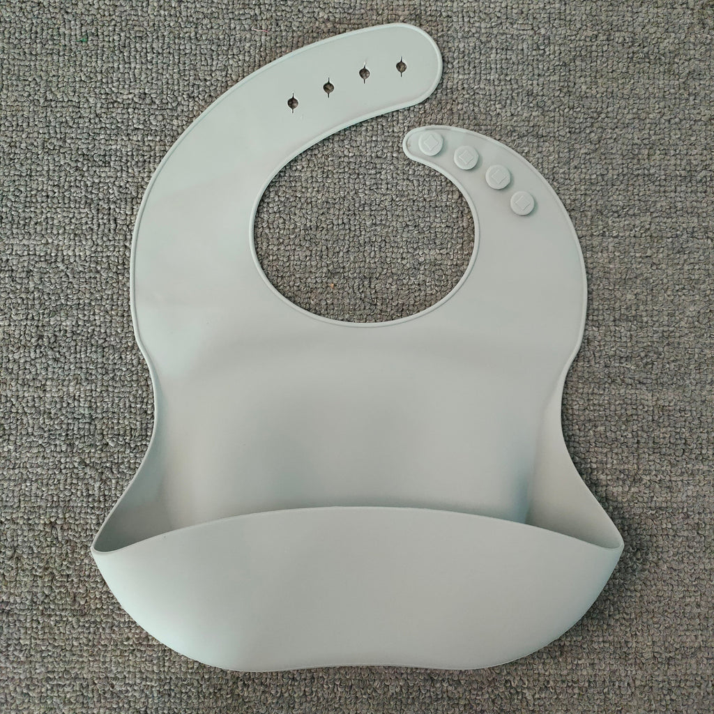 WarmNest™ Silicone Baby Bib with Food Catcher – Waterproof & Easy Clean